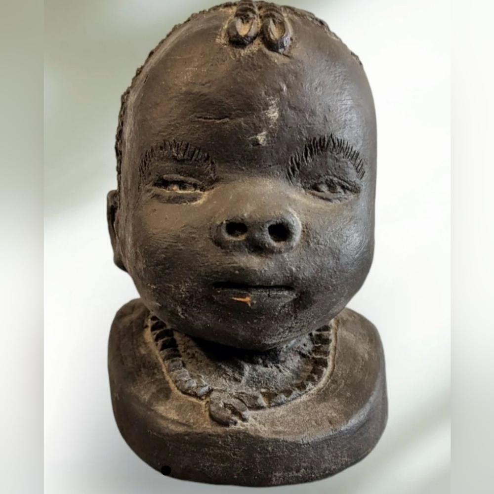 African Art. Boy Clay Head